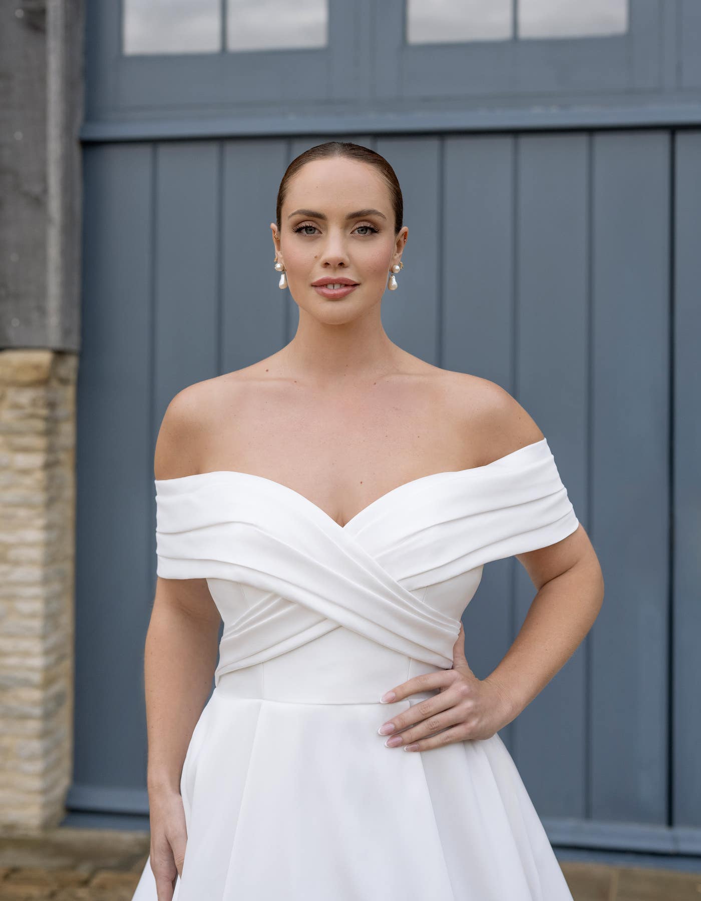 Byron An Byron an draped ballgown with pockets | wed2b
