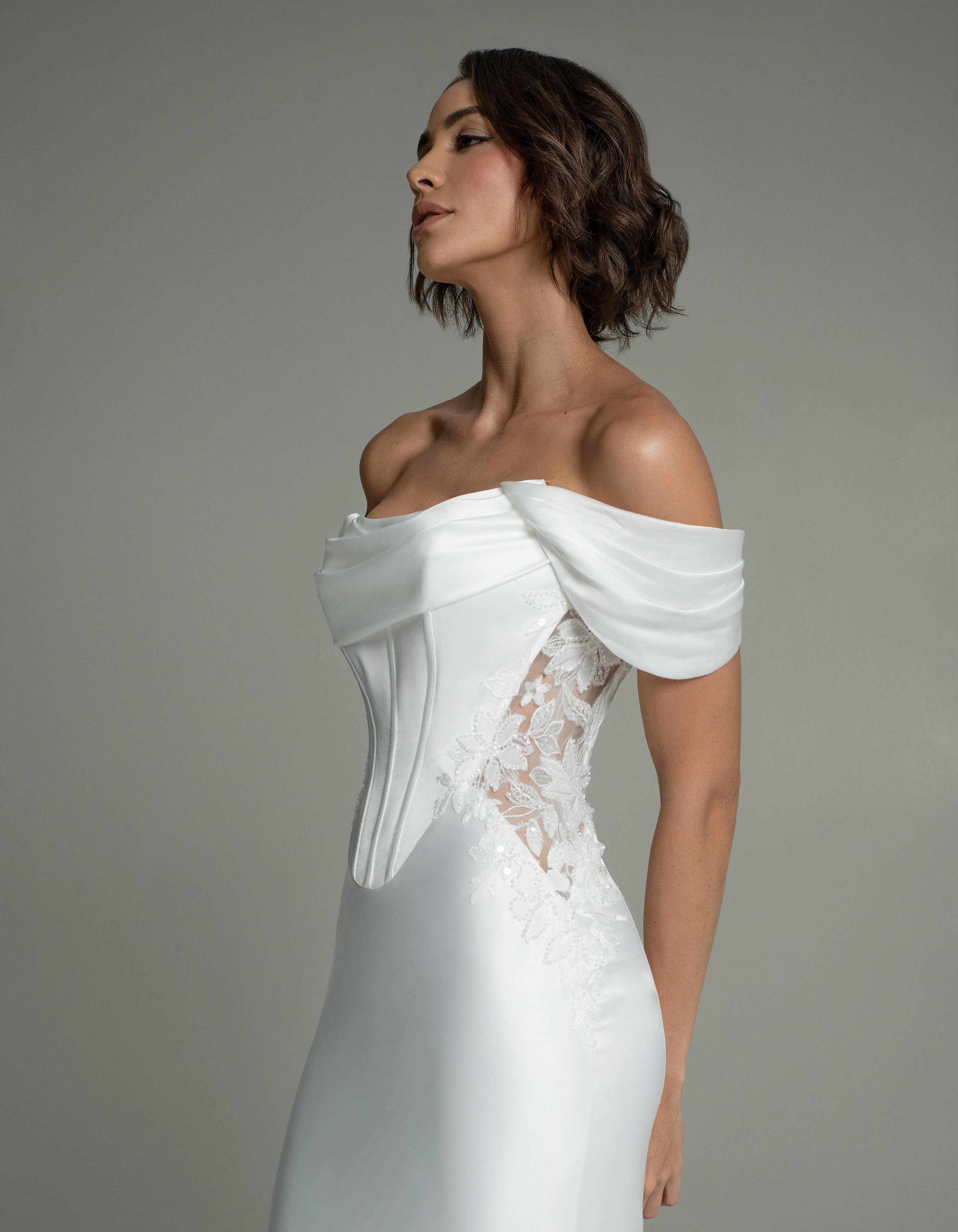Vergara - a satin sheath with basque waist and appliqué<br>