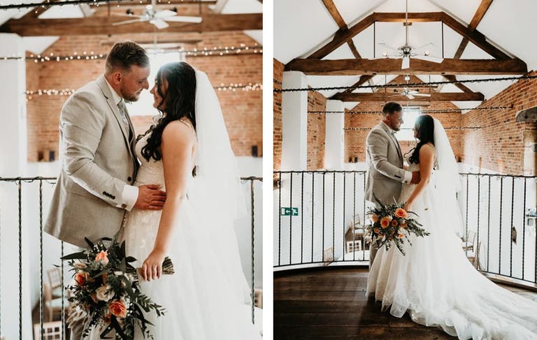 Bride and groom posing for photo smiling at each other