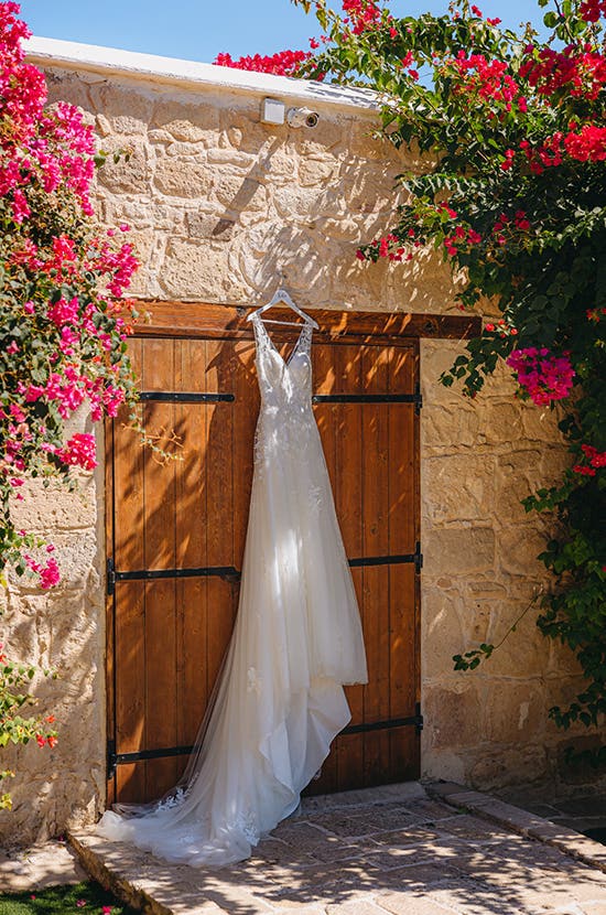 Katie's lace wed2b wedding dress hanging up