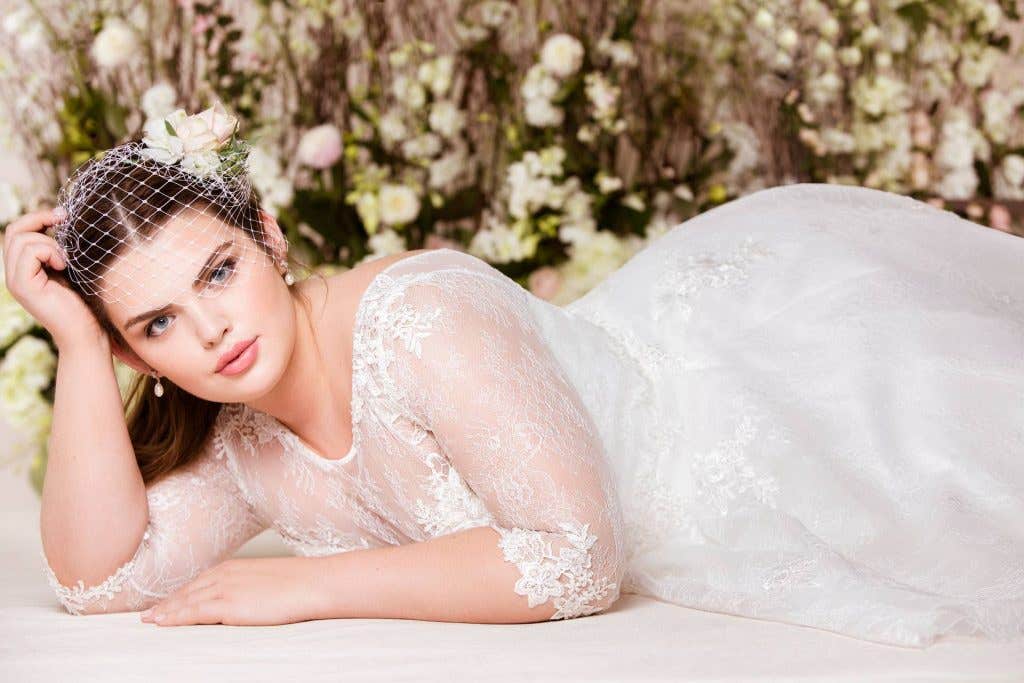 Celebrate your curves with our plus size wedding dresses