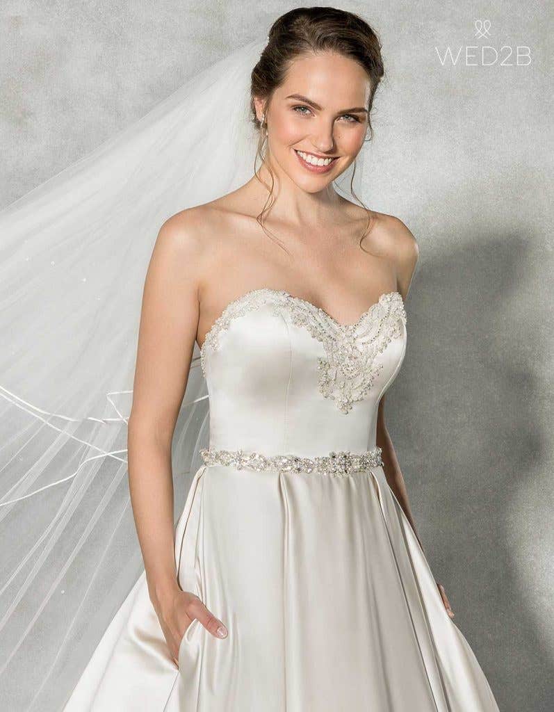 Beckett with Estella belt - a wedding dress with pockets