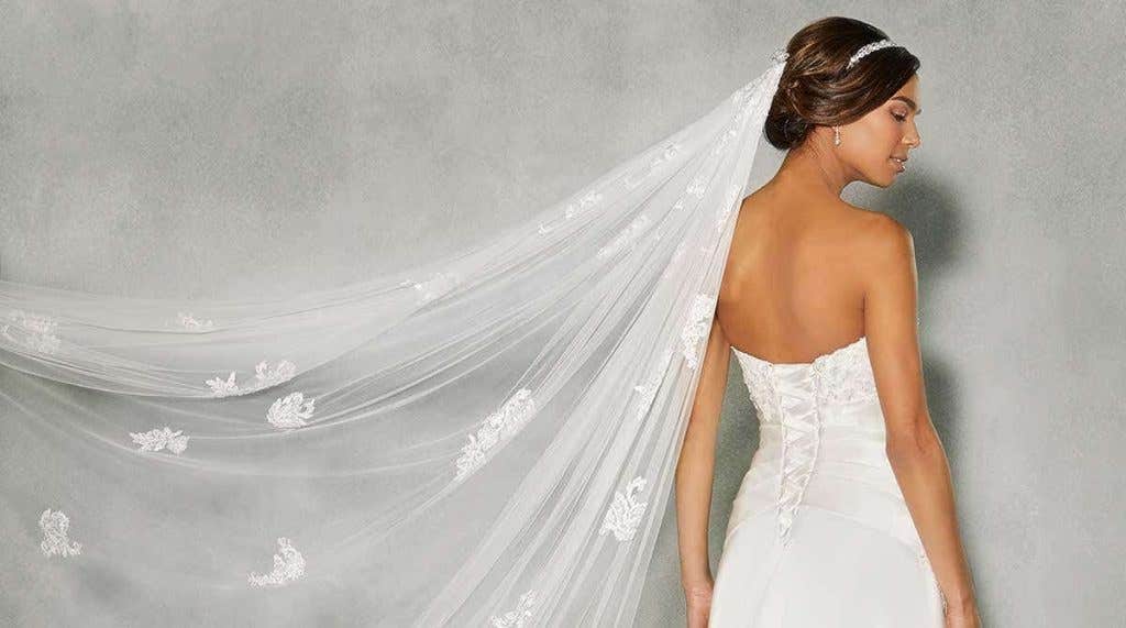 We love lace-up wedding dresses!
