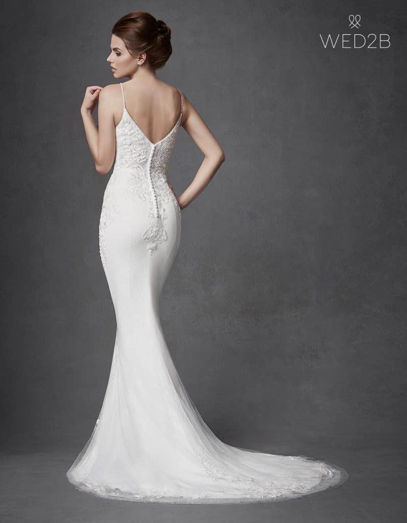 Discover your perfect plunging neckline wedding dress… - Keegan