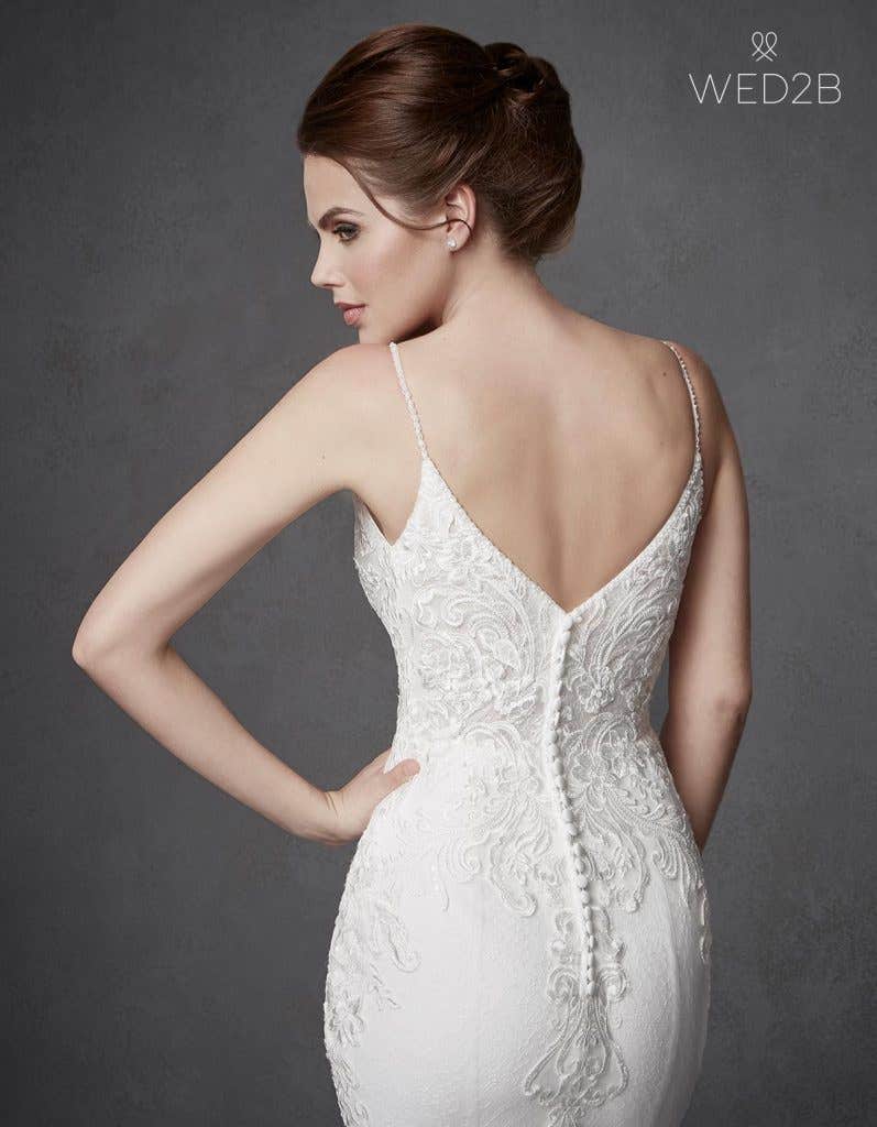 Discover your perfect plunging neckline wedding dress… - Keegan