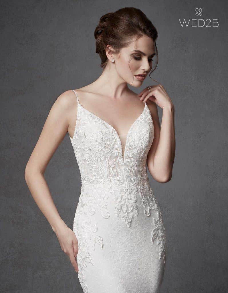 Discover your perfect plunging neckline wedding dress… - Keegan