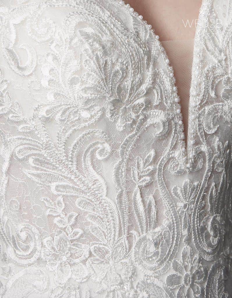 Discover your perfect plunging neckline wedding dress… - Keegan