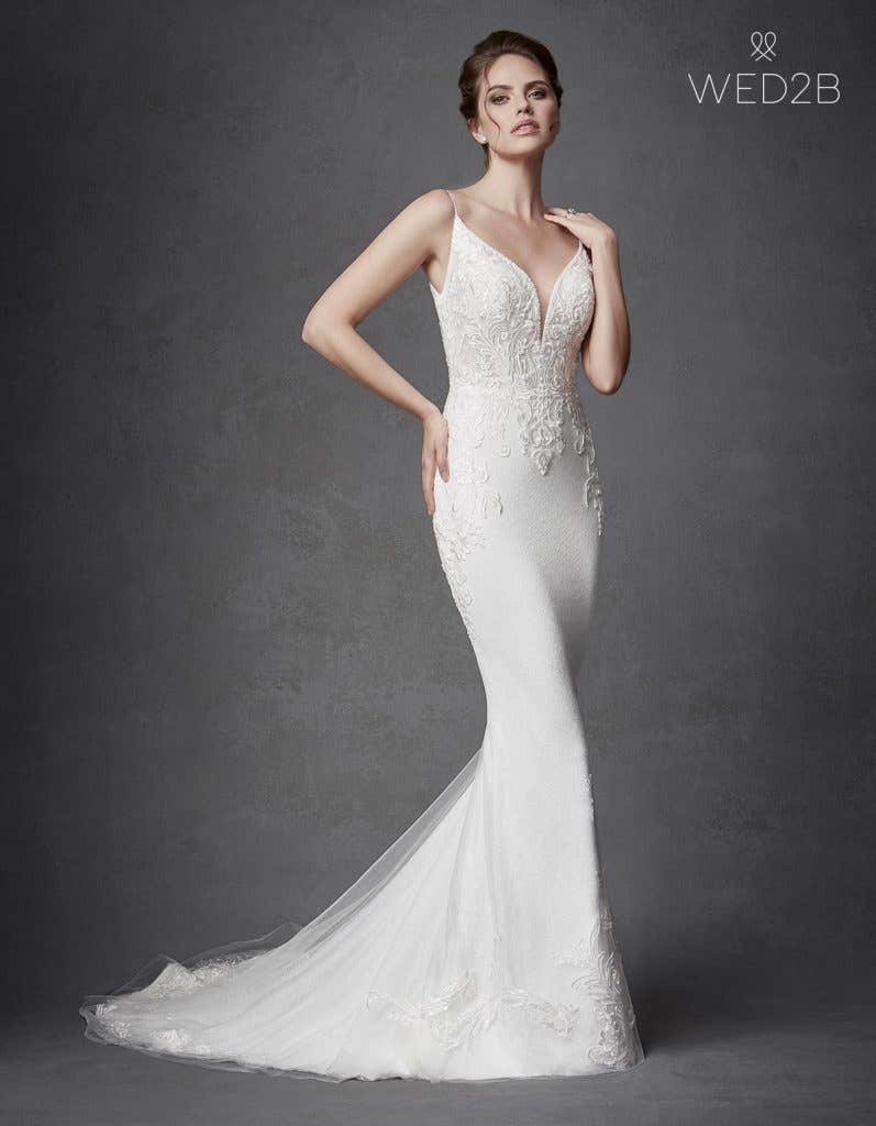 Discover your perfect plunging neckline wedding dress… - Keegan