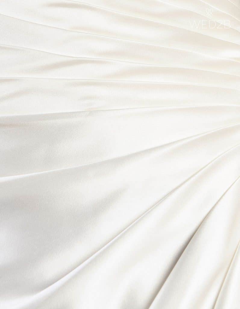 Detail view of wedding dress with straps Emery
