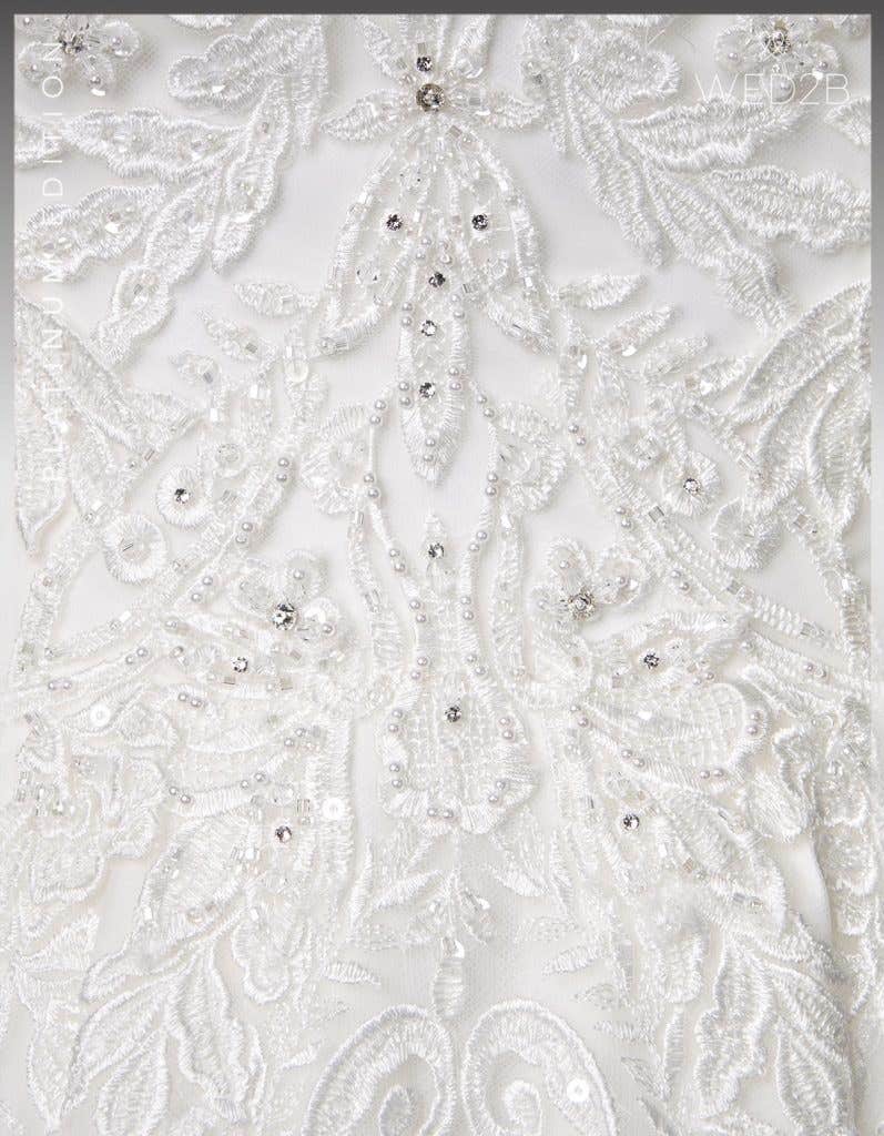 Detail view of wedding dress with straps Karolina