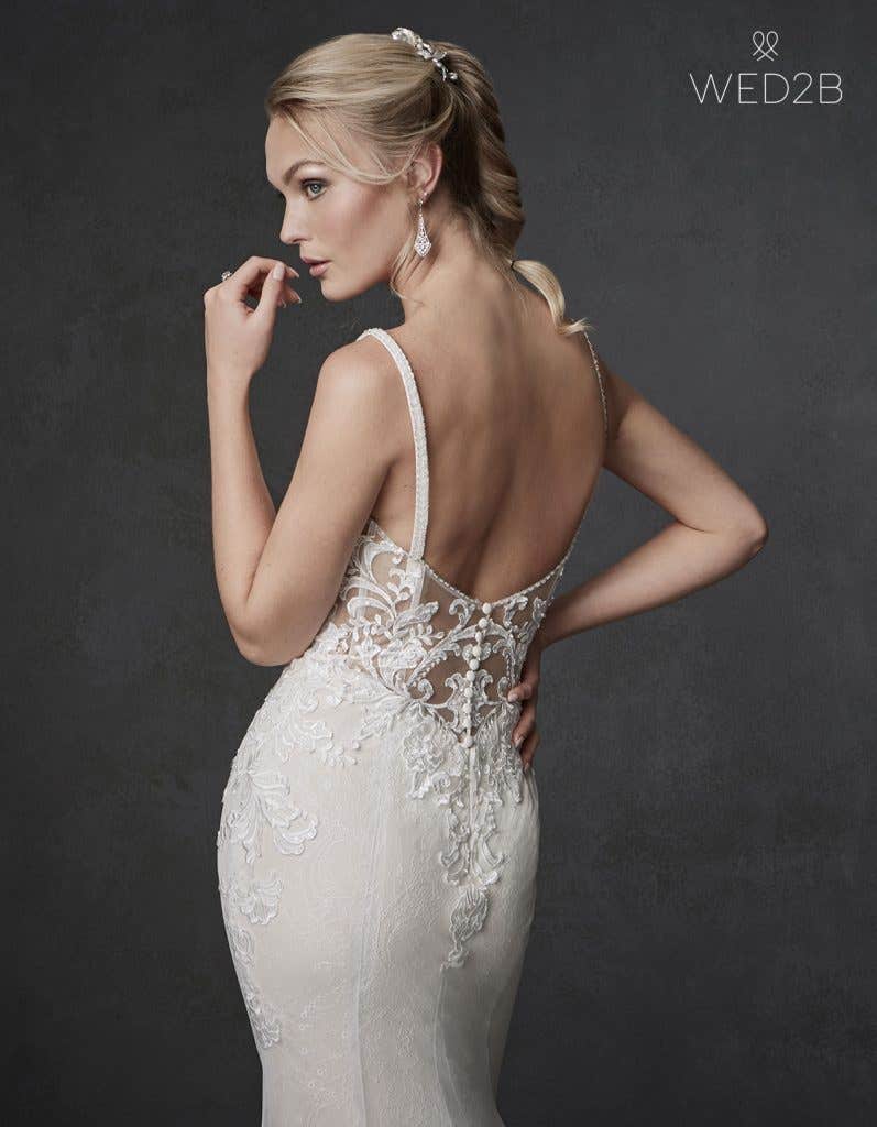 Back crop view of wedding dress with straps Syrah