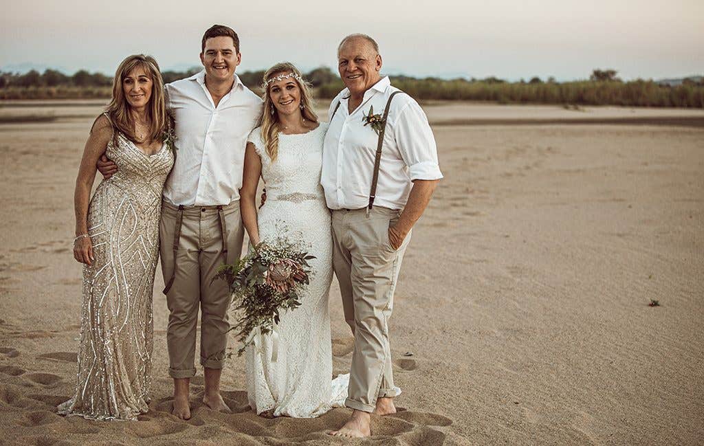 Happy families at their safari wedding