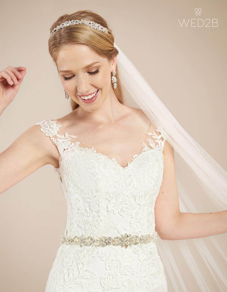 Front crop view with accessories of vintage wedding dress Flynn by Anna Sorrano