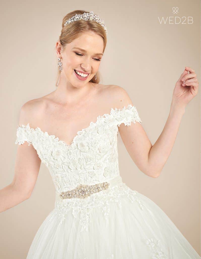 Front crop view with accessories of vintage wedding dress Grady by Viva bride