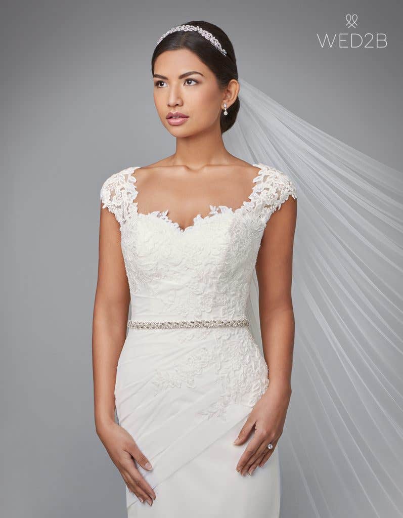 Front view of pleated wedding dress Adina by Anna Sorrano with accessories