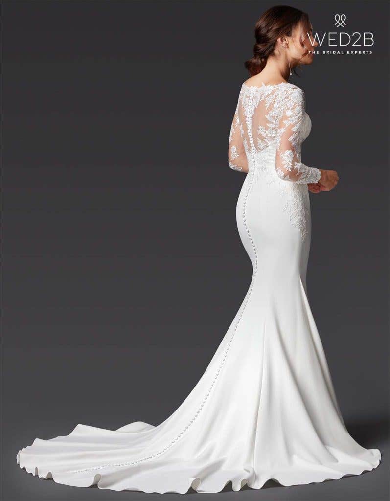 Ellwood a long sleeve lace wedding dress from The Signature Collection