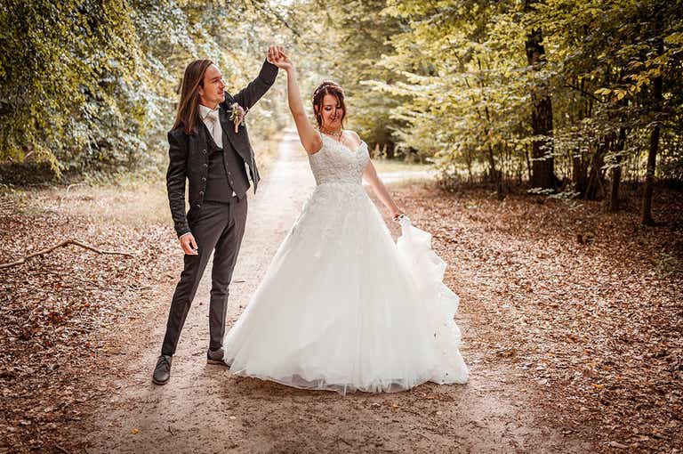 Rein twirling Jolien in her WED2B Wedding dress