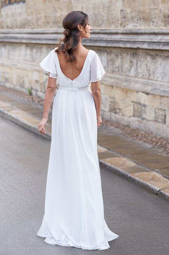 Full length back image of Everlee an Aline wedding dress, a soft boho design