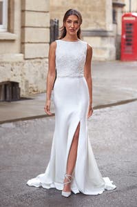 Full front image of Fritz a contemporary wedding dress with a high neckline