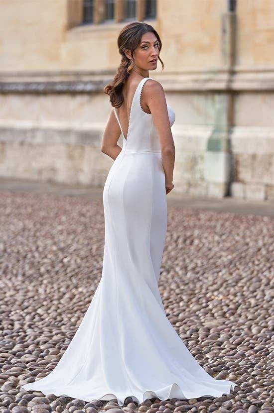 Full back image of Jett a timeless wedding dress in delicate crepe