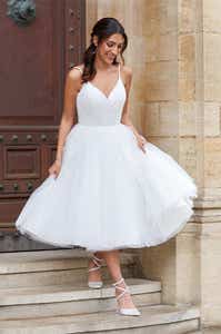 Full front image of Sofia a bouncy short wedding dress with glitter tulle