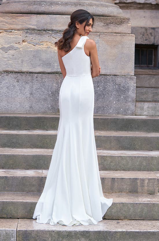 Full back image of Tyra a sheath wedding dress with a sexy split