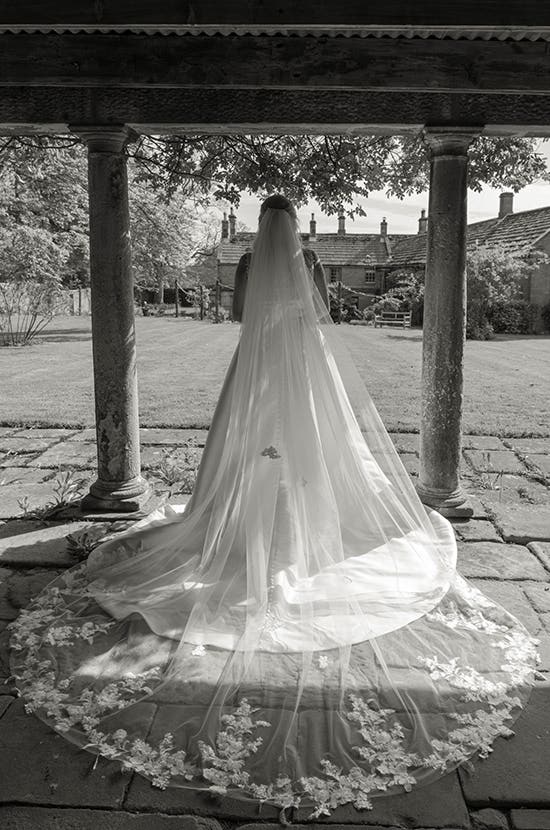 Bride in her wed2b wedding dress and bridal veil