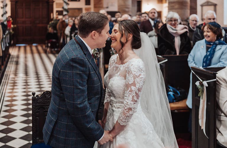 Rhiannon and Edward during their wedding ceremony