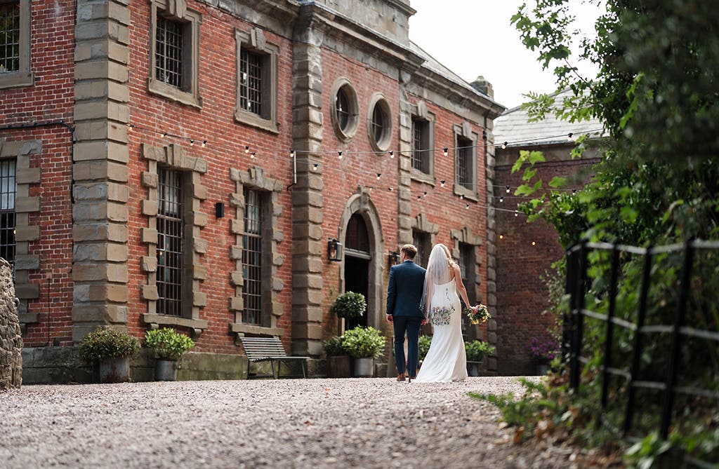 Bride and groom celebrating their wedding day outdoors