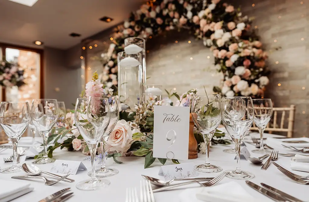 Floral wedding table setting from Catherine and Mike’s wedding