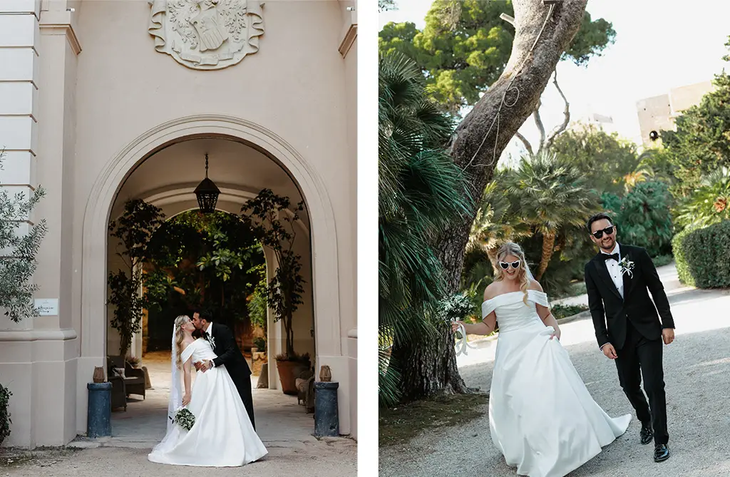 Georgia and James embracing beneath a stone archway wearing sunglasses on their Italy wedding day