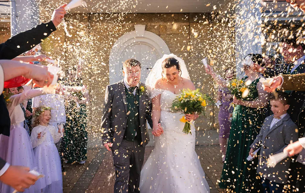 Lucy and Ryan at their rustic green wedding