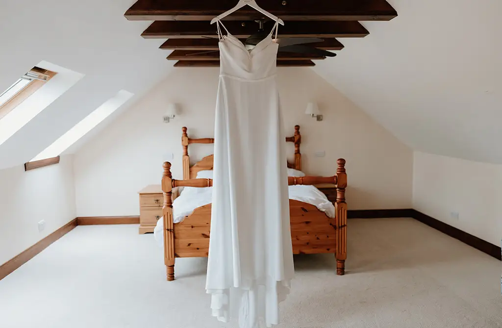 Real bride Becky wearing Alber by Sofia Cruz with groom Josh on their wedding day