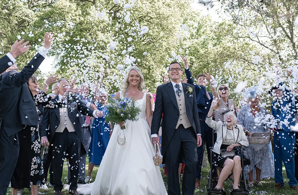 Real bride Rachel wearing Roan by Sofia Cruz with groom Tom on their wedding day