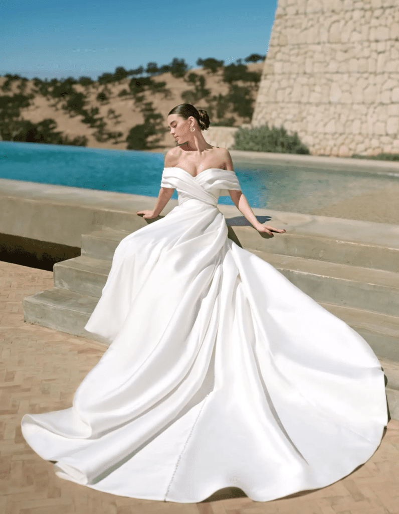 Sofia Cruz wedding dress with a contemporary silhouette and fashion-forward bridal detail