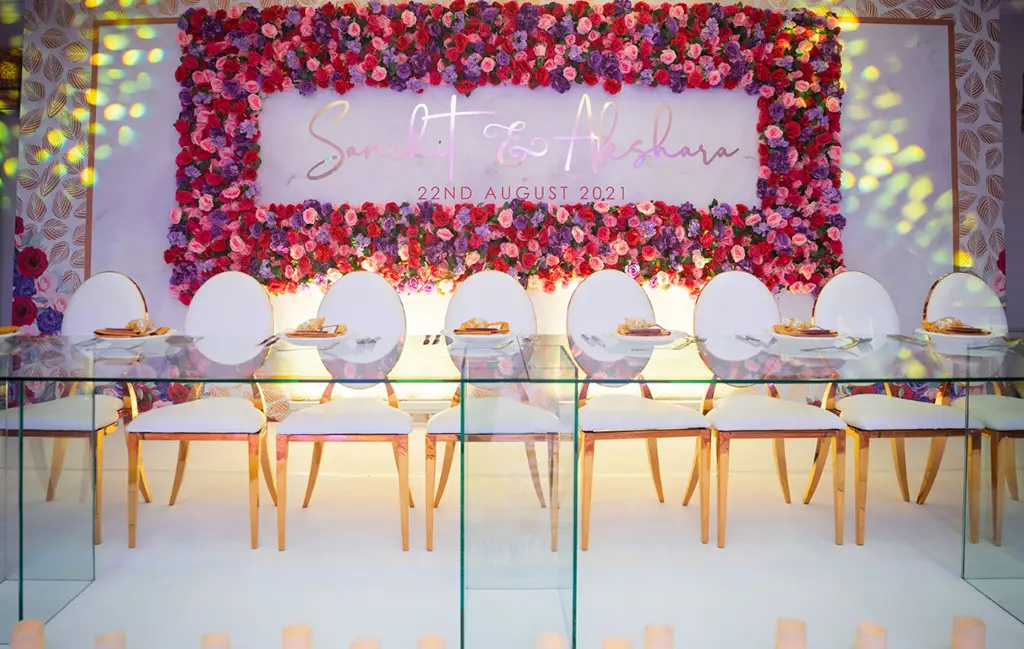Akshara and Sanchit’s statement flower display above the top table