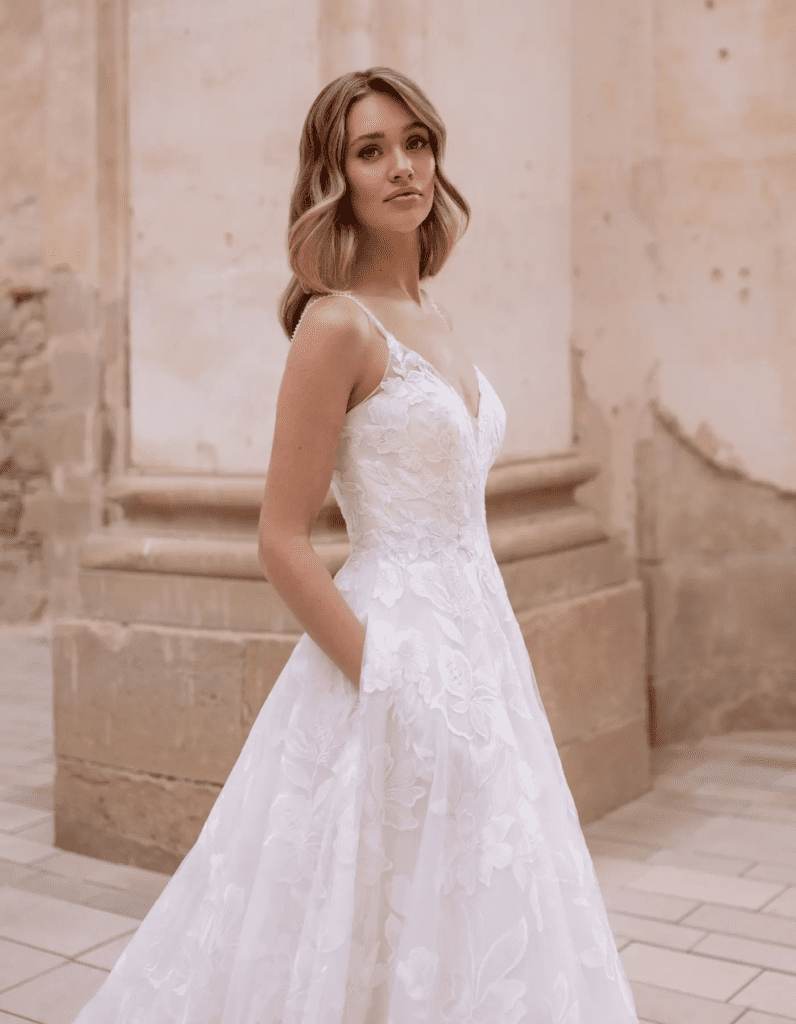 Understated floral wedding dresses Novaan and Penny with subtle floral lace