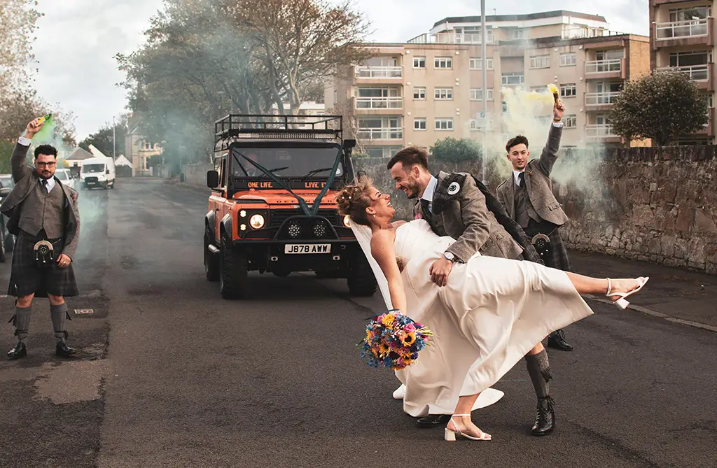 Daisey and Kieran together in the streets after their wedding ceremony
