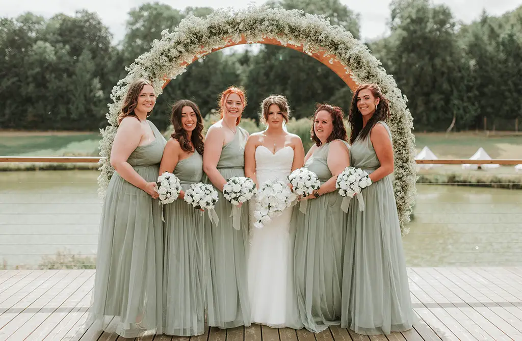 Kacey and Bradley’s bride and bridesmaids’ bouquets with spring flowers