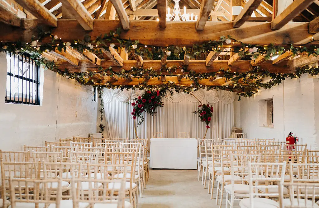 Faye and Dean’s floral ceremony displays with colourful wedding flowers