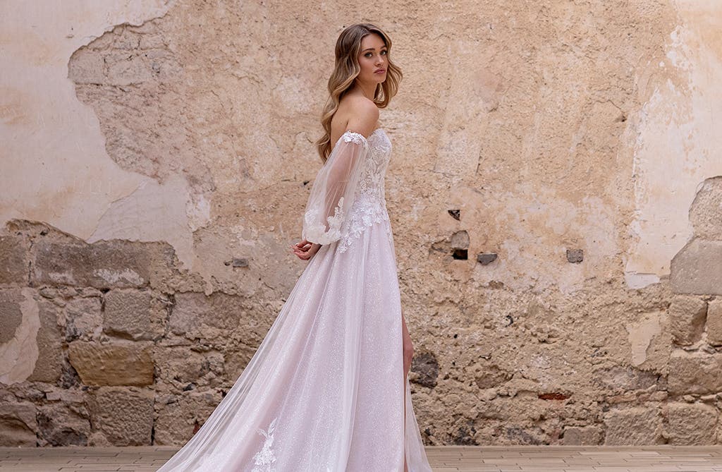 Fashion-forward mini wedding dress with detachable skirt for a modern bridal look