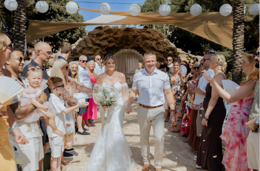Abbey's father walking her down the aisle in Cyprus