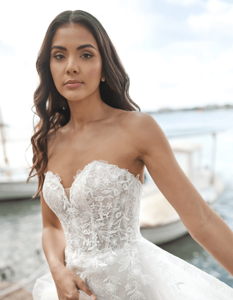 Bride wearing Tarnie, a tulle wedding dress by Heidi Hudson