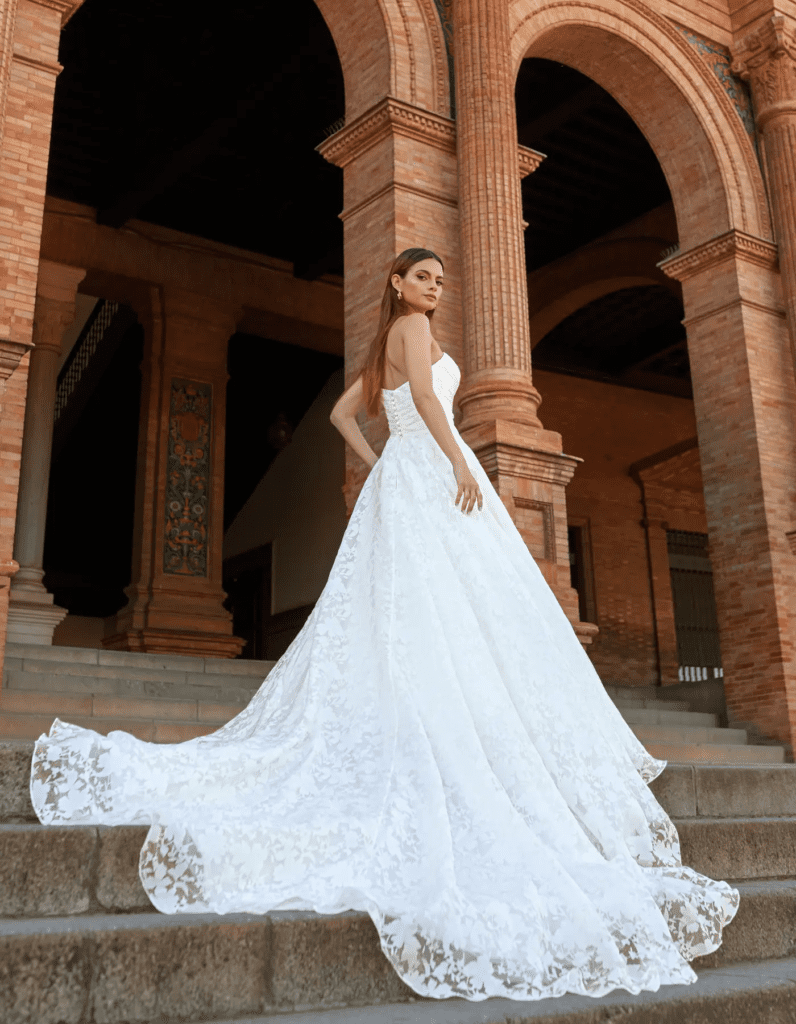 Bride wearing Yustina, an organza wedding dress by Aaliyah Quinn