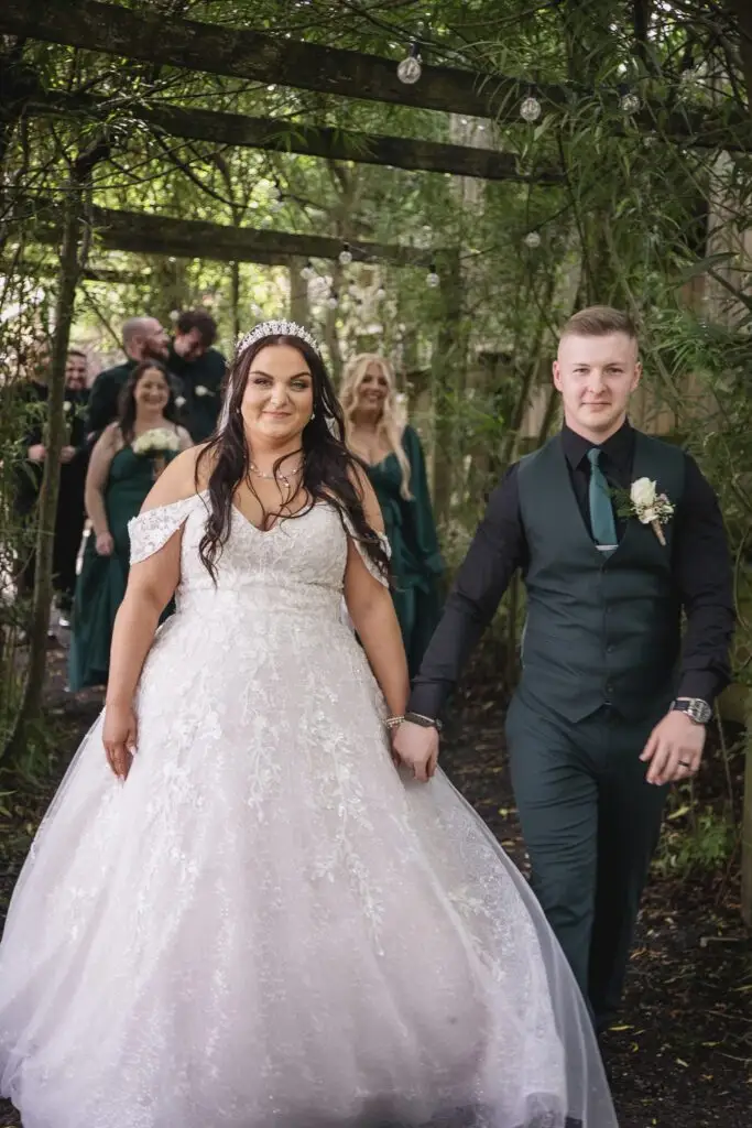 Rachel and Ryan enjoying countryside views on their wedding day