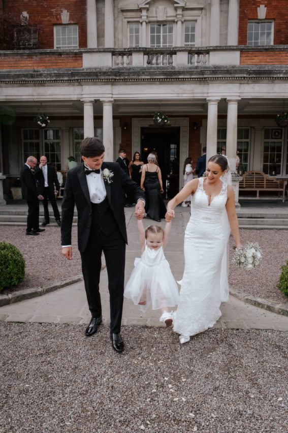 Guests celebrating at Charlotte and Oliver's wedding