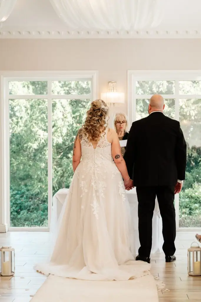Jessica and Lee celebrating with family at their wedding