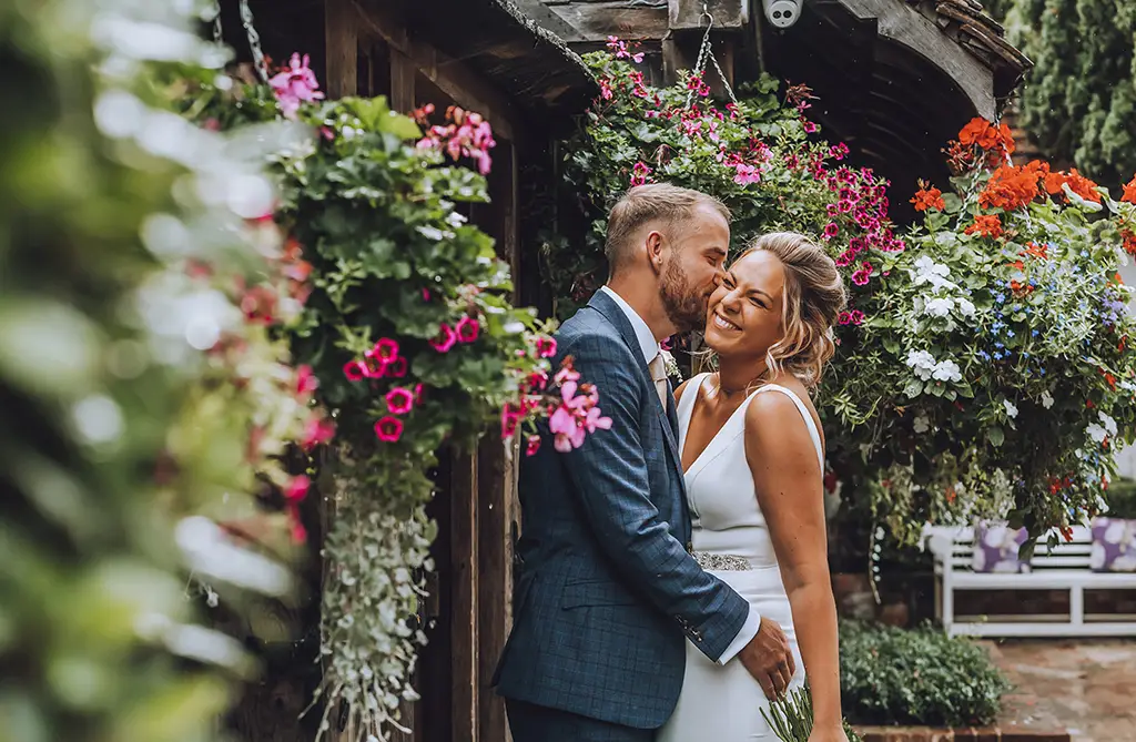 Real brides Sallie and Sam at their intimate luxury hotel wedding