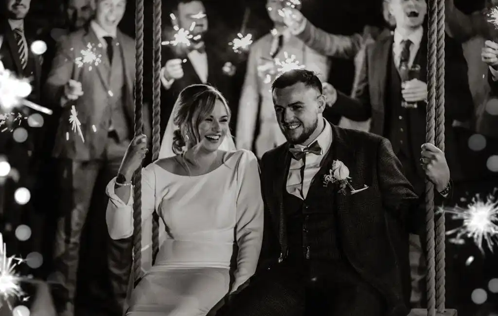 Bride Bianca in a long sleeve wedding dress at her winter wedding