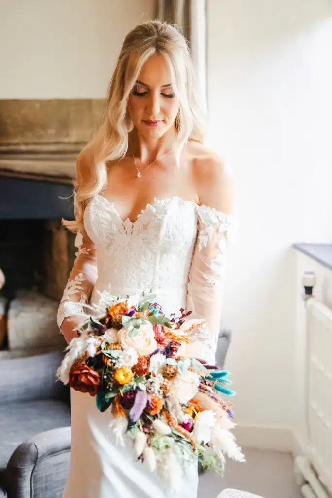 Jaynie in her Havanna off-the-shoulder wedding dress at The Bay Tree Hotel